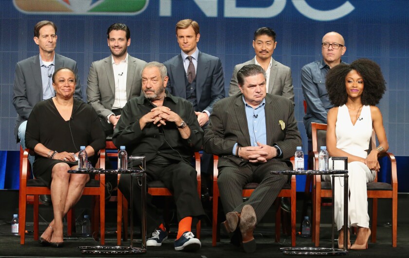 Back from left, "Chicago Med" Executive Producer Andrew Dettmann, actors Colin Donnell, Nick Gehlfuss and Brian Tee and Executive Producer Matt Olmstead join, front from left, actress S. Epatha Merkerson, Executive Producer Dick Wolf, actor Oliver Platt and actress Yaya DaCosta at the NBCUniversal portion of the 2015 Television Critics Assn. media tour in Beverly Hills on Thursday.