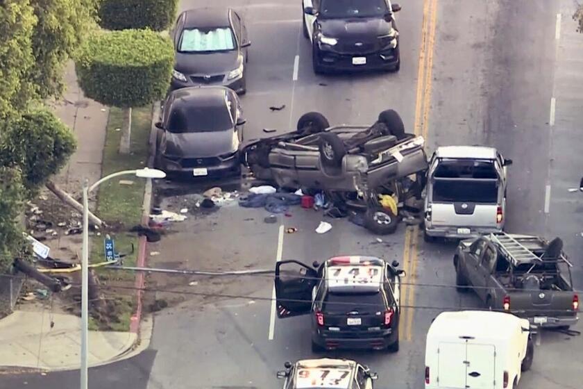 An investigation is underway after an SUV driven by a burglary suspect was left upside down following a wild chase that ended in the Central-Alameda neighborhood of Los Angeles Wednesday morning. The brief pursuit began around 6:10 a.m. and ended minutes later when the vehicle crashed on Hooper Avenue between 46th Street and Vernon Avenue.