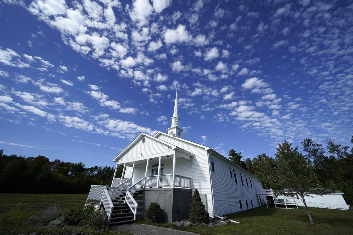 An exterior view of the Tri Town Baptist Church and its spire.