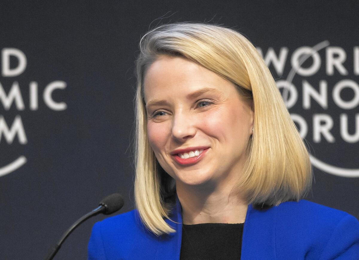 The day after announcing that Yahoo's board would examine spinning off its core business, CEO Marissa Mayer revealed that her identical twin girls were born that morning.