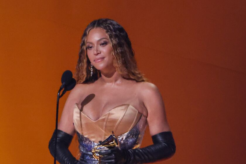 Beyoncé accepts the award for best dance/electronic music album at the 65th Grammy Awards