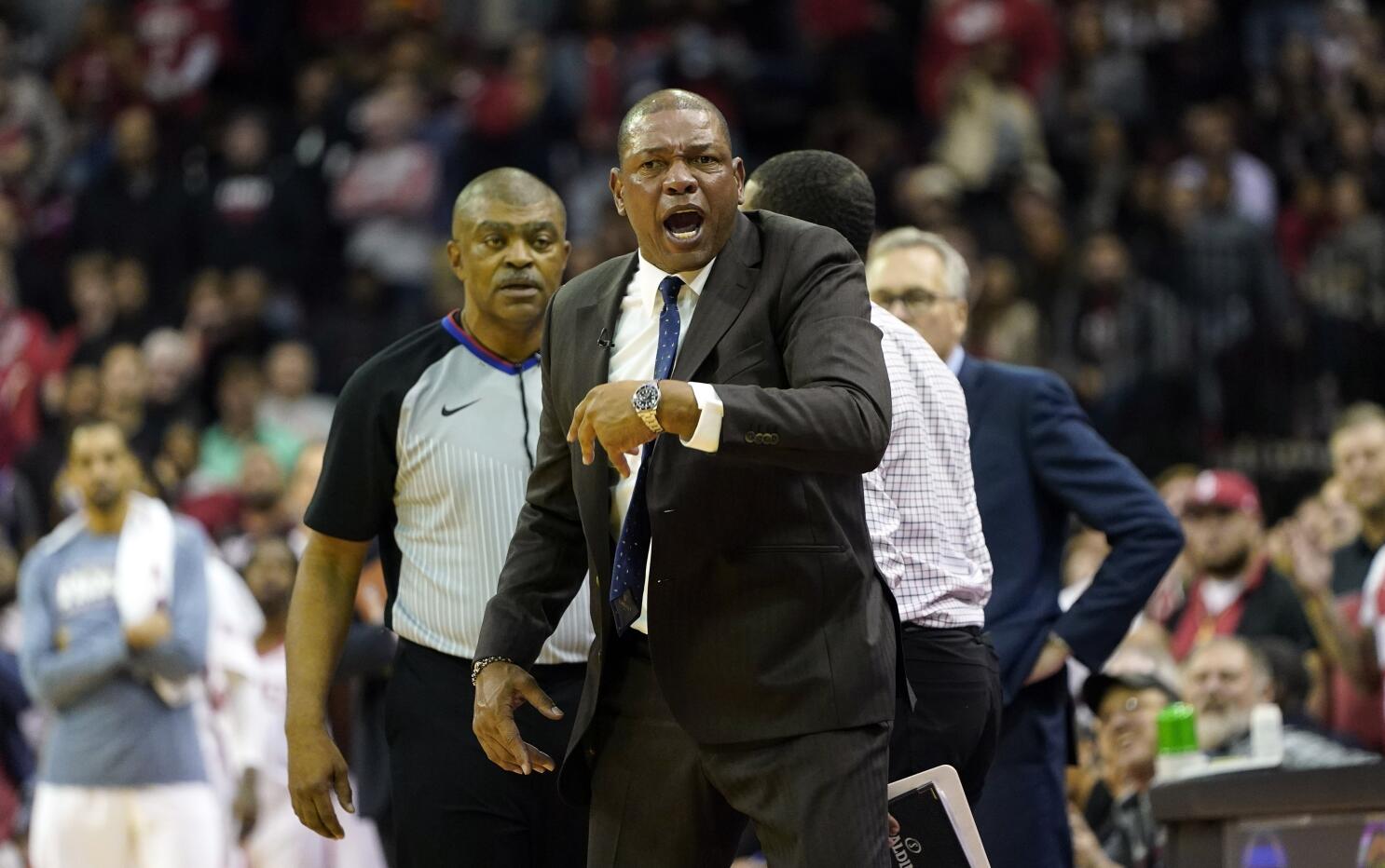 Like father, like son: Both Riverses ejected from Clippers' game in Houston  - Los Angeles Times