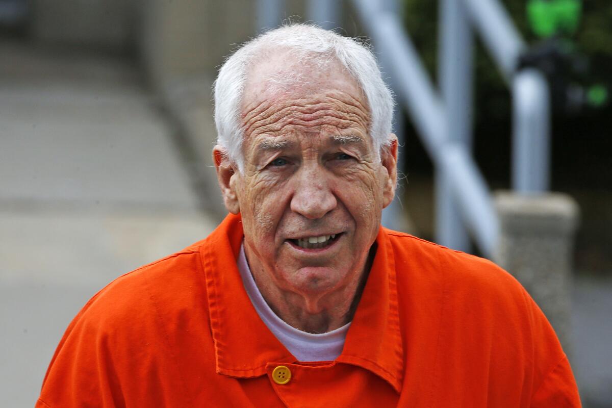 Former Penn State University assistant football coach Jerry Sandusky leaves the Centre County Courthouse in Bellefonte, Pa., on Monday after arguments on his request for an evidentiary hearing.