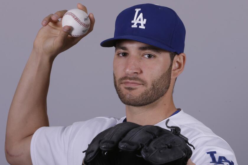 Dodgers pitcher Brandon Beachy poses for a photo during media day in spring training.