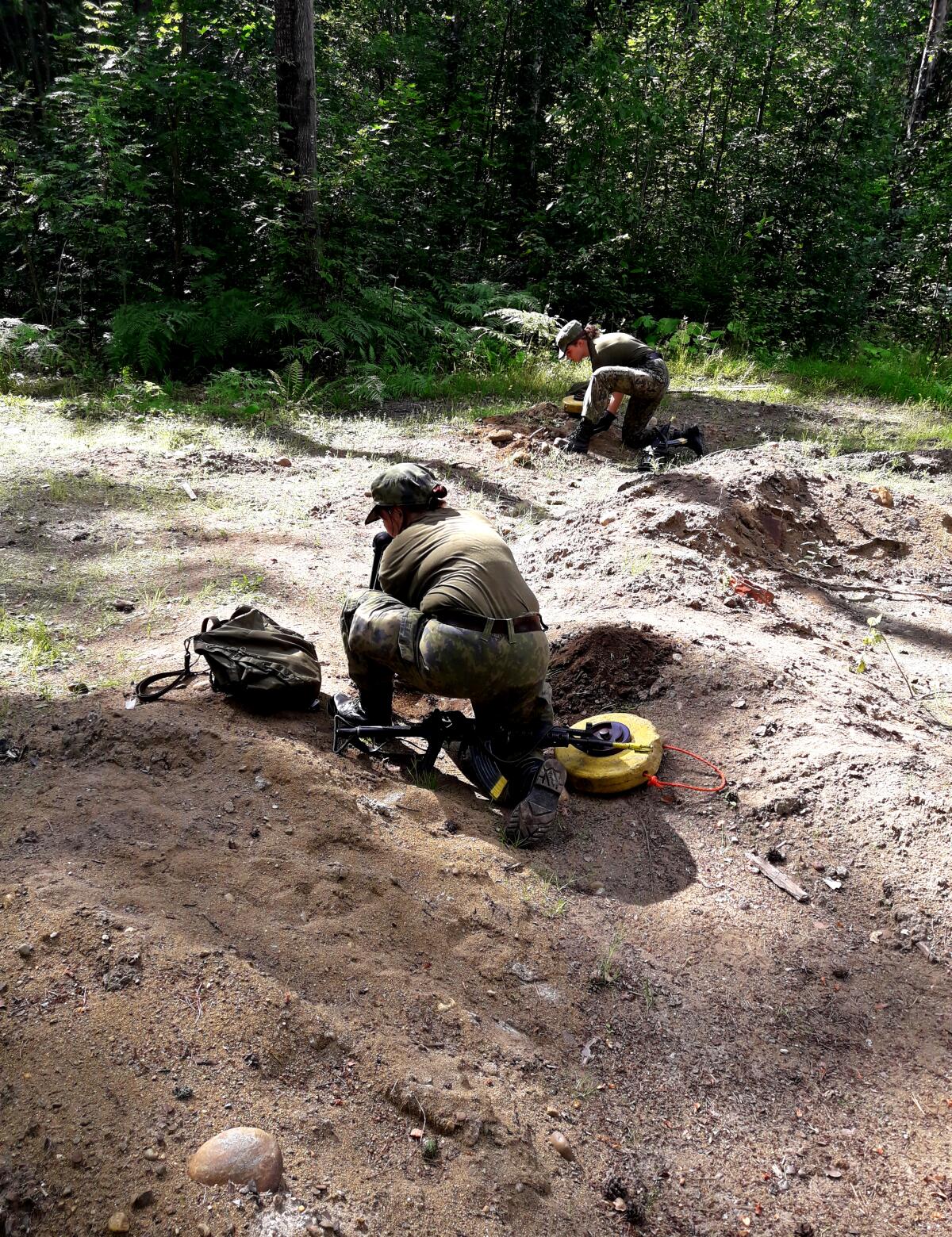 Women receive military training.