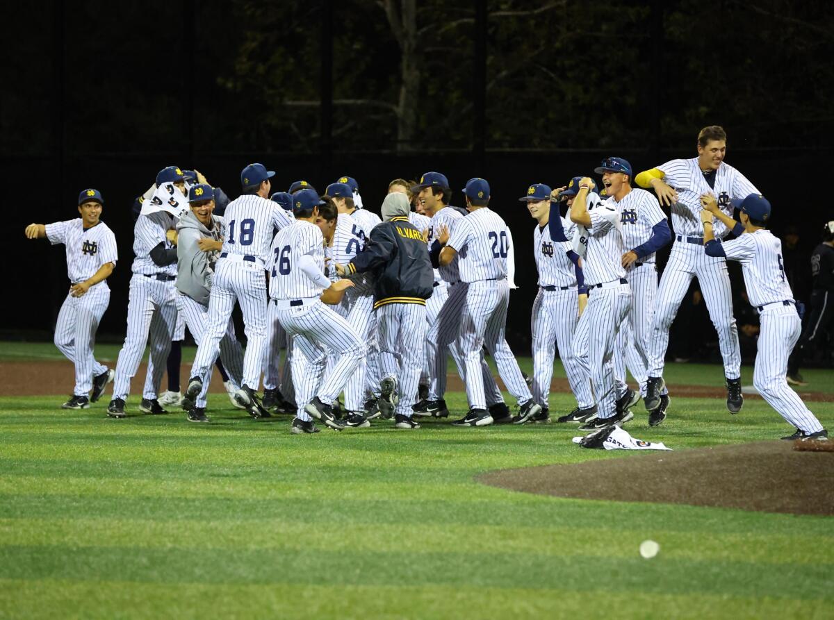 Sherman Oaks Notre Dame players celebrate after winning the South Division of the Boras Classic.