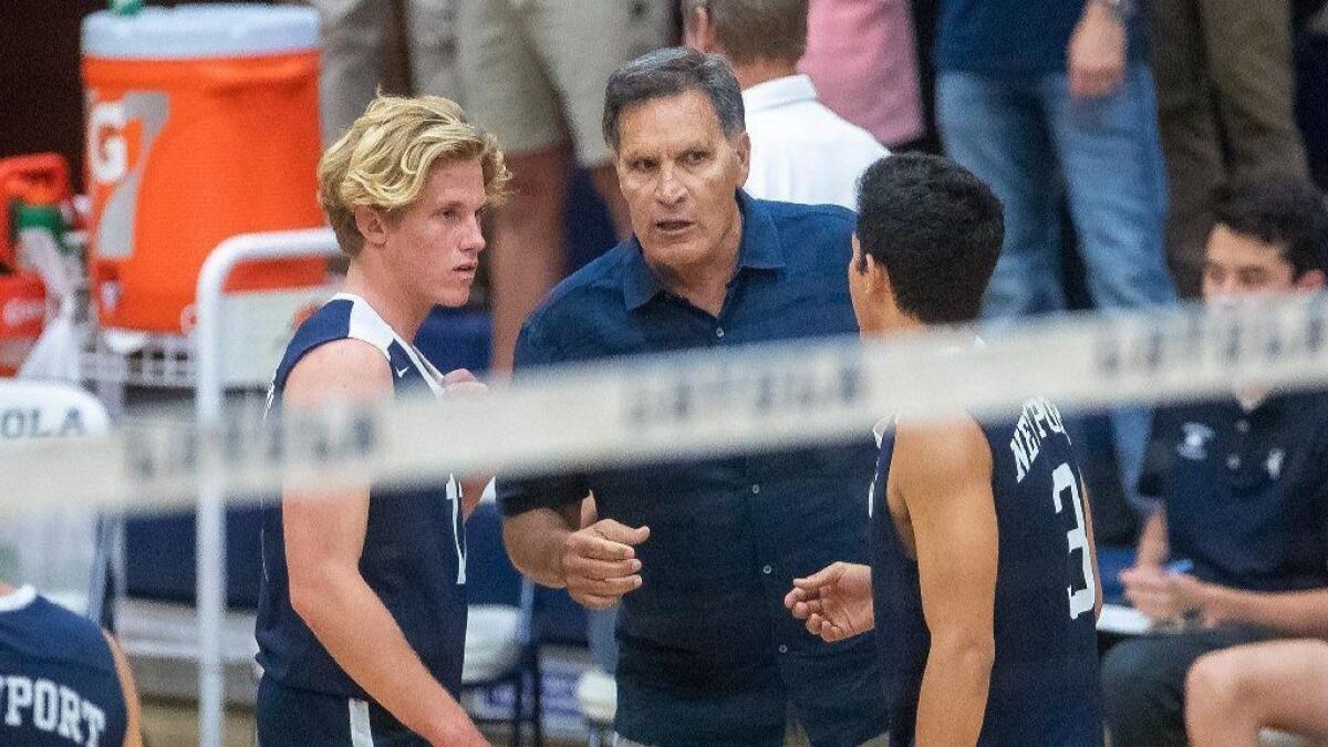 Newport Harbor coach Rocky Ciarelli talks to Jack Higgs, left, and Joe Karlous during a CIF Southern Section Division 1 semifinal match against Los Angeles Loyola on May 8.