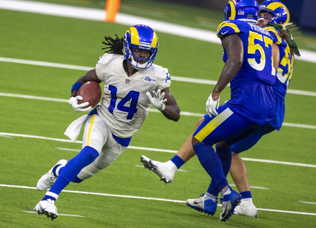 Nsimba Webster returns a kickoff during a Rams scrimmage at SoFi Stadium last year.