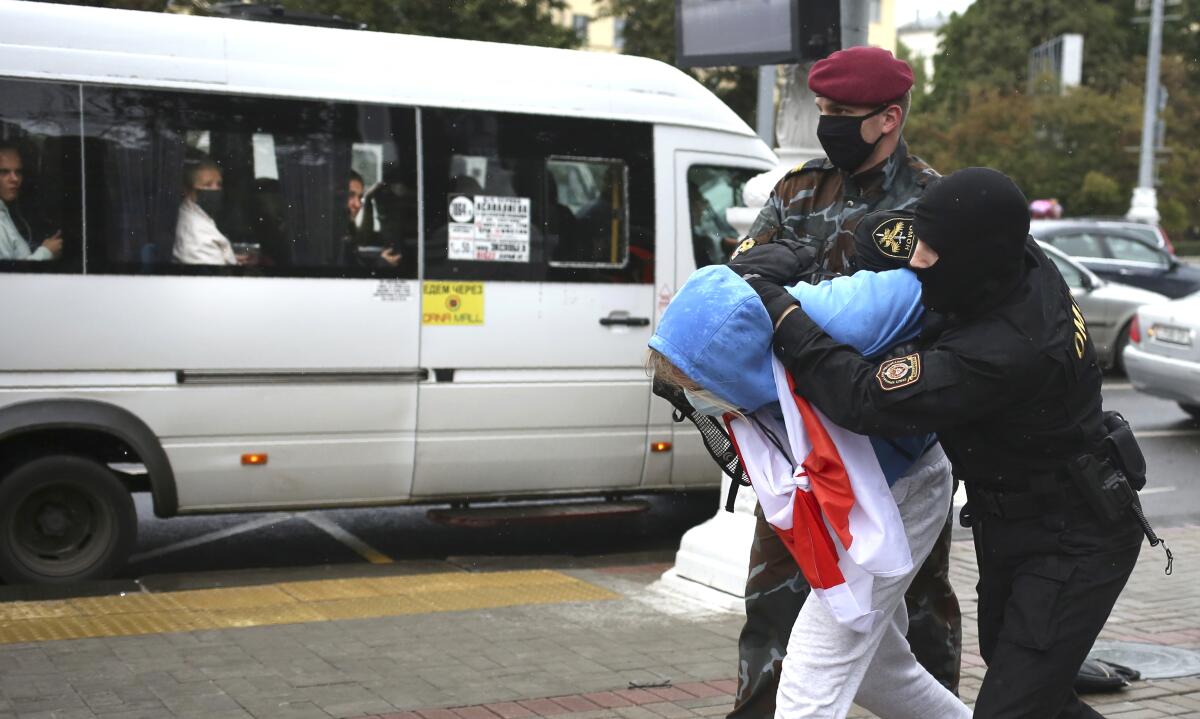 Police detain a student protester in Minsk, Belarus, on Tuesday.