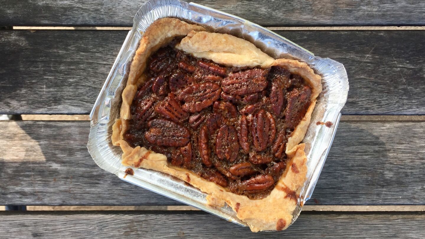 The pecan pie at this welcoming South Side shop doesn't skimp on the part that counts. Each "slice" (really, a small stand-alone rectangular pie) comes studded with a generous spread of huge, whole pecans. But what is hidden underneath is just as important. A generous layer of dark runny caramel adds the right amount of sweetness to each bite. In a very unscientific study, I'd say that the portion feeds at least two people, making the $6 price a real bargain. 2234 E. 71st St., 773-363-9330, givemesomesugah.com — Nick Kindelsperger