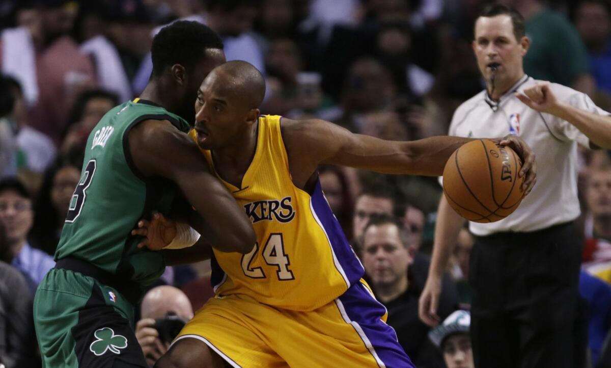 Kobe Bryant, shown driving against Boston's Jeff Green on Friday, is providing most of the intriguing storylines for the Lakers this season.