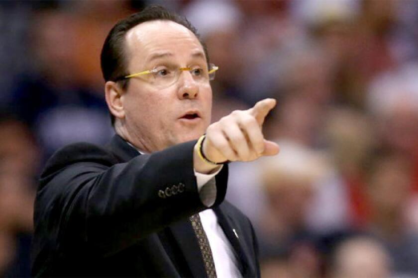 Wichita State Coach Gregg Marshall is one of several coaches who have been mentioned as a candidate for the vacant UCLA job, but he says he's happy where he is now.