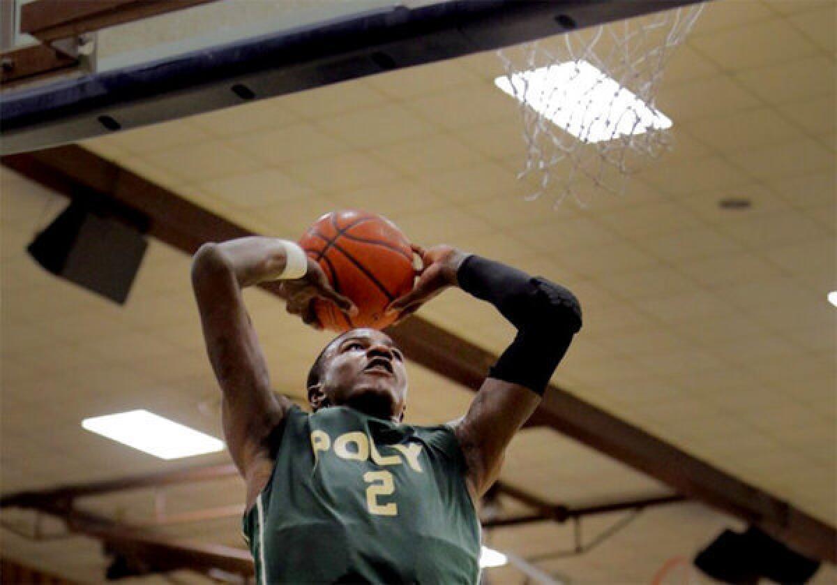 Poly's Jordan Bell goes up for a dunk during a game against Loyola in the Southern Section 1AA quarterfinal.