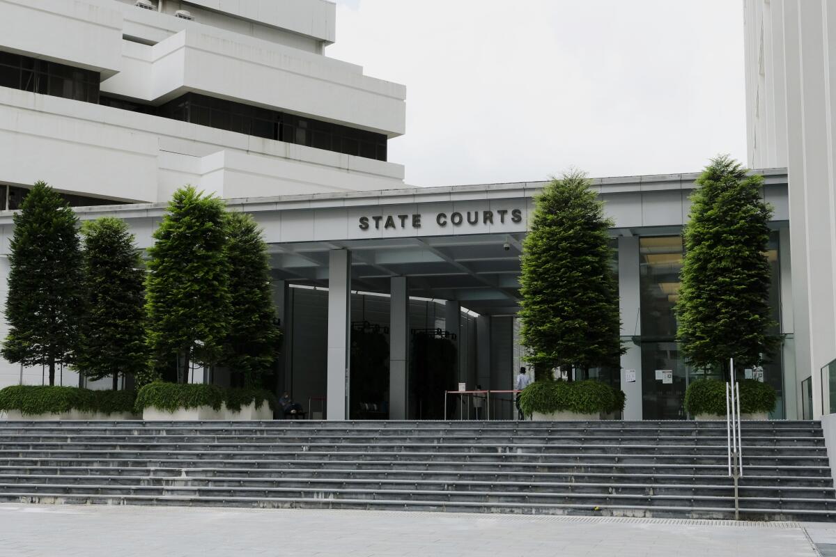 FILE - This photo shows the main entrance of the State Courts in Singapore, on Feb. 25, 2022. An Australian was sentenced Friday, April 8, to five and a half years in jail for killing a Singaporean man and injuring his wife by hurling a wine bottle, with the court saying the man's actions reflected religious hostility toward Muslims. (AP Photo/Toh Ee Ming, File)
