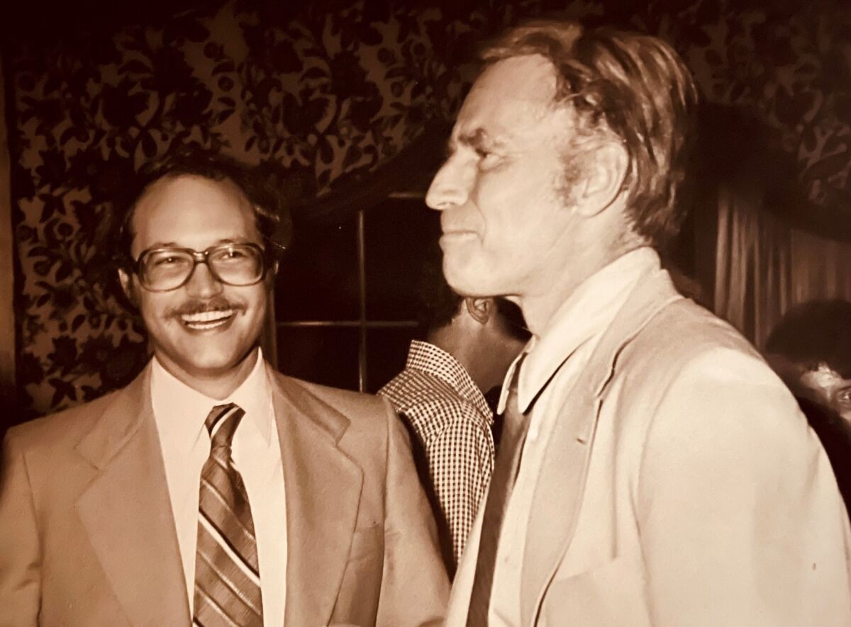 Andrew Friedenberg with Charlton Heston, who co-starred in "The Mountain Men." Friedenberg handled the film's world premiere.