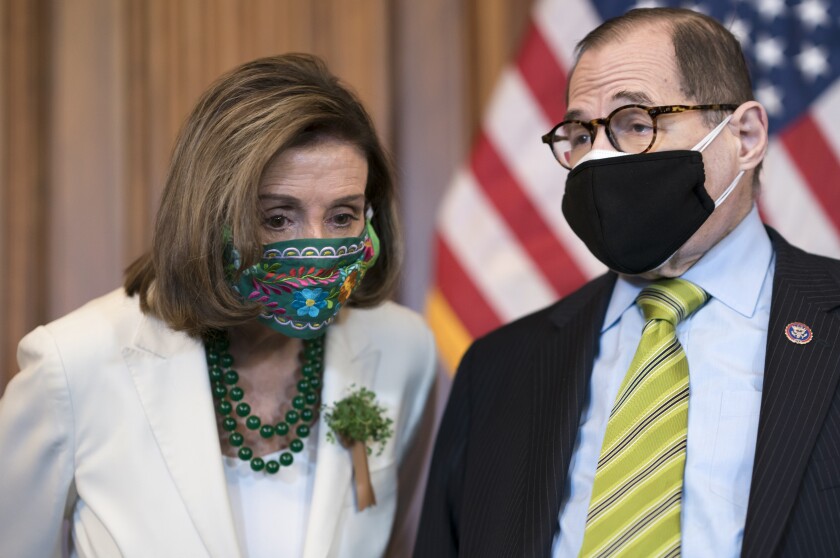 Speaker of the House Nancy Pelosi and Rep. Jerrold Nadler wearing masks