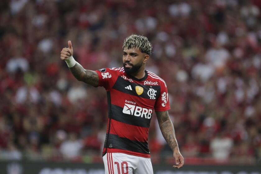 FILE - Gabriel Barbosa of Brazil's Flamengo reacts during a Copa Libertadores round of 16 first leg soccer match against Paraguay's Olimpia at Maracana stadium in Rio de Janeiro, Brazil, on Aug. 3, 2023. The Court of Arbitration for Sport says Brazilian soccer player Gabriel Barbosa can resume playing pending an appeal against his ban for a breach of doping rules. (AP Photo/Bruna Prado, File)