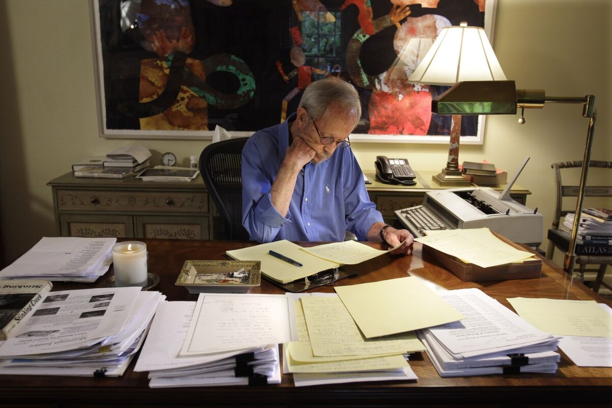 Author Elmore Leonard, shown in 2010, works on a manuscript at his home in Bloomfield Township, Mich.