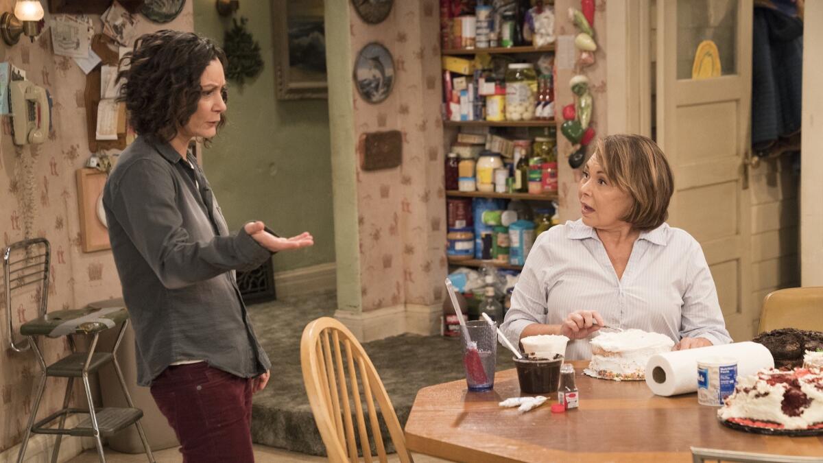 This image released by ABC shows Sara Gilbert, left, and Roseanne Barr in a scene from "Roseanne." The sudden cancellation of one of TV's top comedies has left a wave of unemployment and uncertainty in its wake.