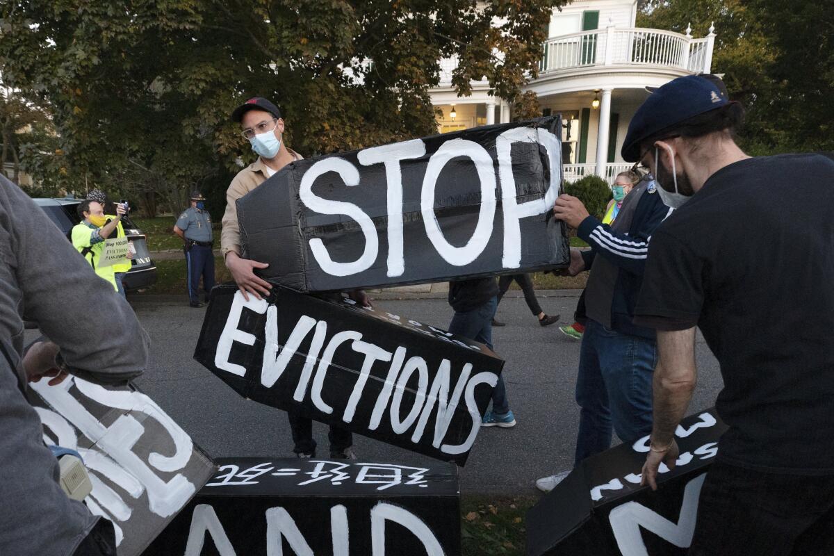 Housing activists protested in October 2020 in front of the home of Massachusetts Gov. Charlie Baker. 