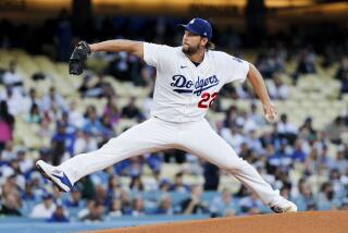 LOS ANGELES, CA - MAY 16: Los Angeles Dodgers starting pitcher Clayton Kershaw delivers.