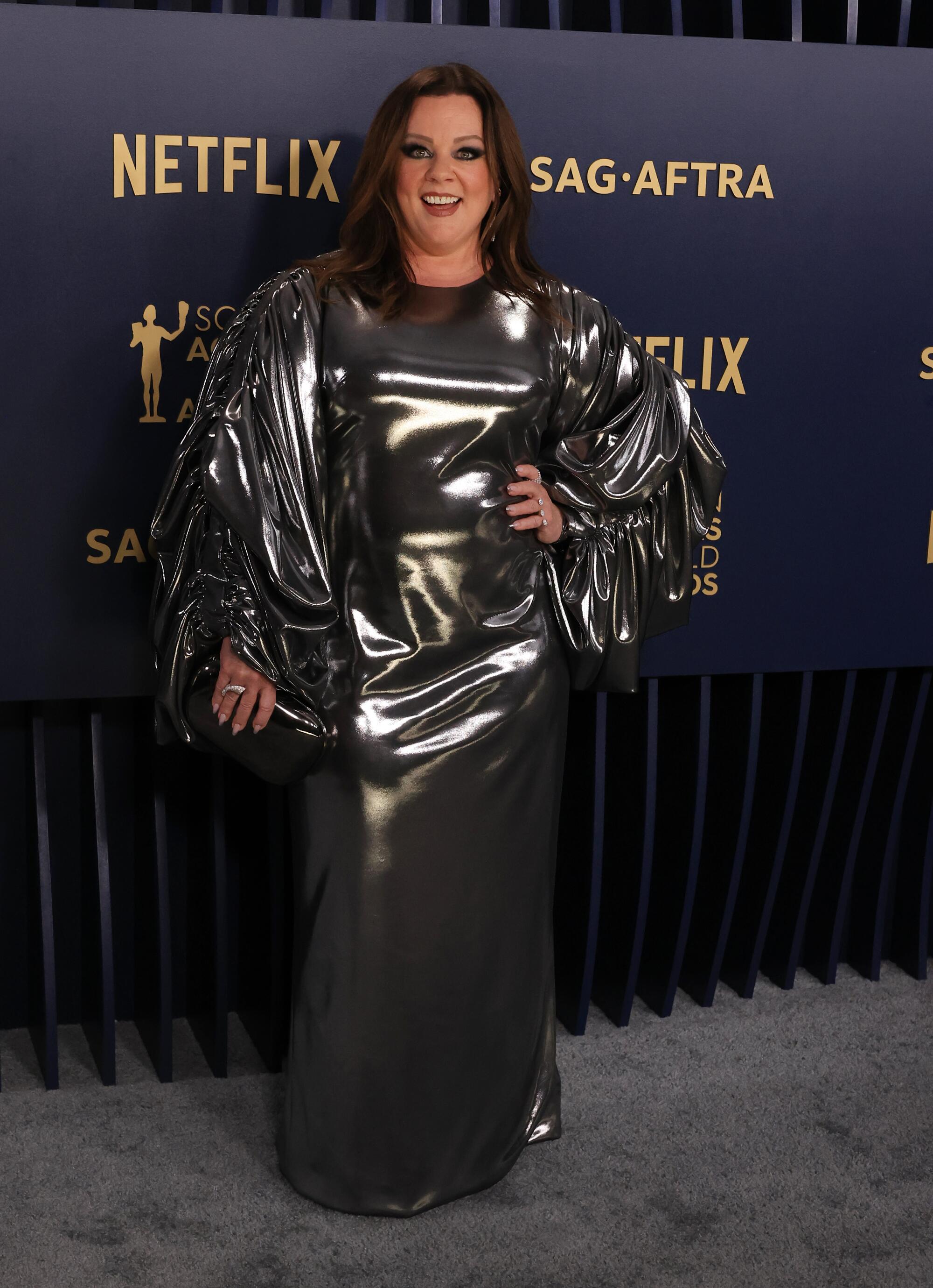 Melissa McCarthy wears a silver dress at the SAG Awards.
