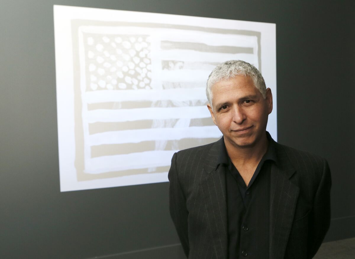 IMAGE DISTRIBUTED FOR NATIONAL PORTRAIT GALLERY - Artist Hugo Crosthwaite, first prize winner of the Outwin Boochever Portrait Competition, at the "The Outwin 2019" opening at the Smithsonian's National Portrait Gallery on Friday, Oct. 25, 2019 in Washington. (Paul Morigi/AP Images for National Portrait Gallery)