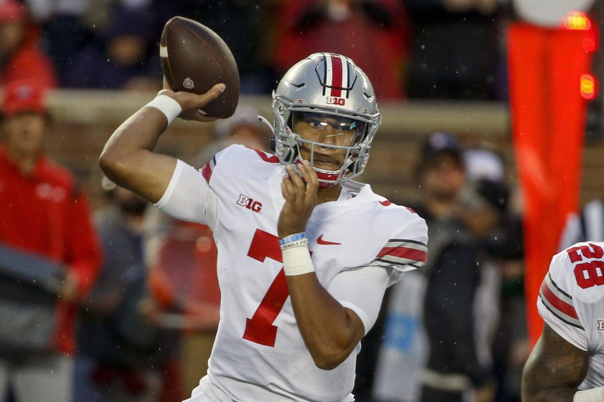 Ohio State quarterback C.J. Stroud (7) passes against Minnesota in the first quarter of an NCAA college football game Thursday, Sept. 2, 2021, in Minneapolis. (AP Photo/Bruce Kluckhohn)