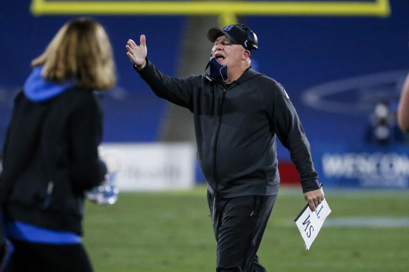 UCLA head coach Chip Kelly reacts during the second half of an NCAA college football game against the Stanford Saturday, Dec. 19, 2020, in Pasadena, Calif. The Stanford won 48-47 in overtime. (AP Photo/Ringo H.W. Chiu)