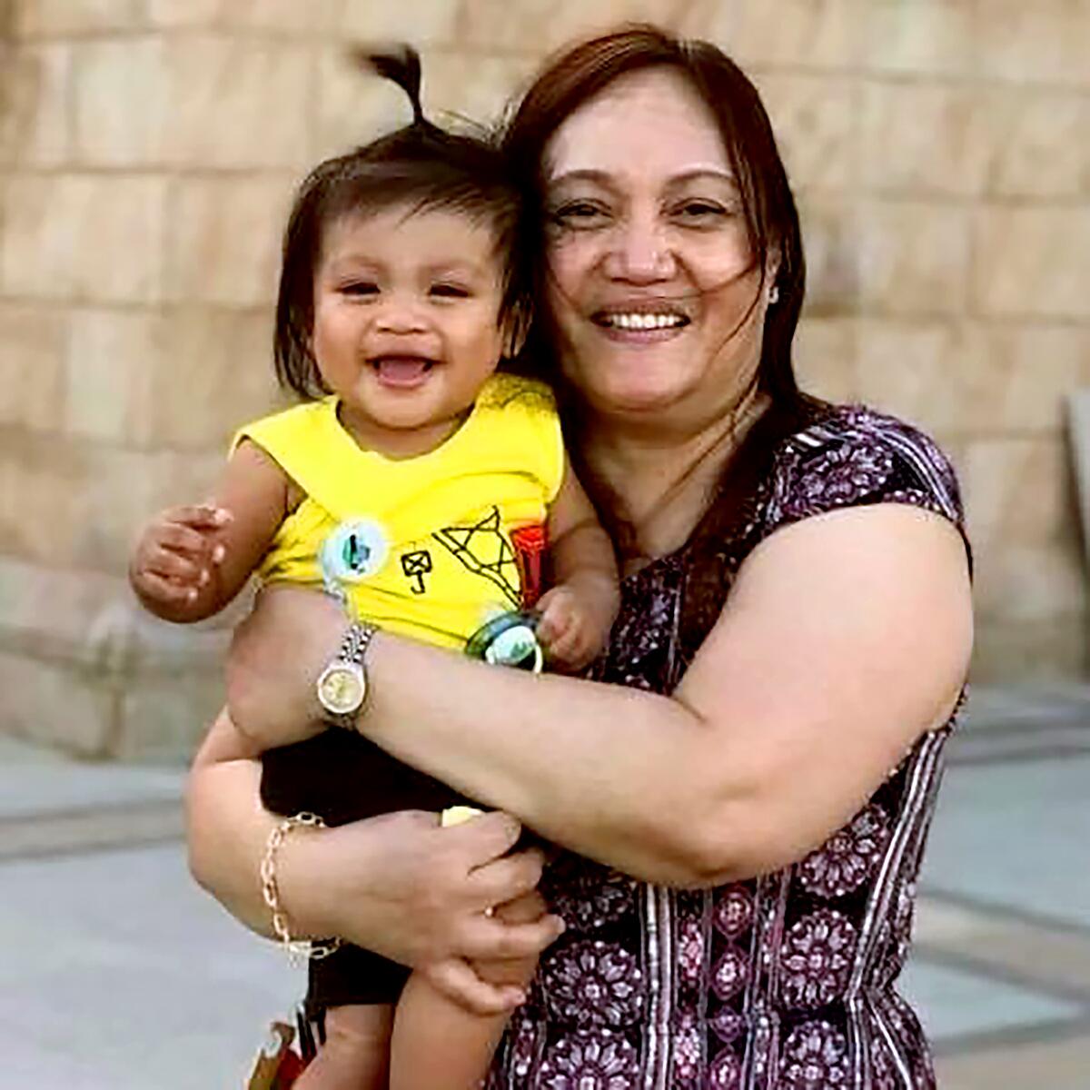 Celia Marcos with her grandson, Drujay.