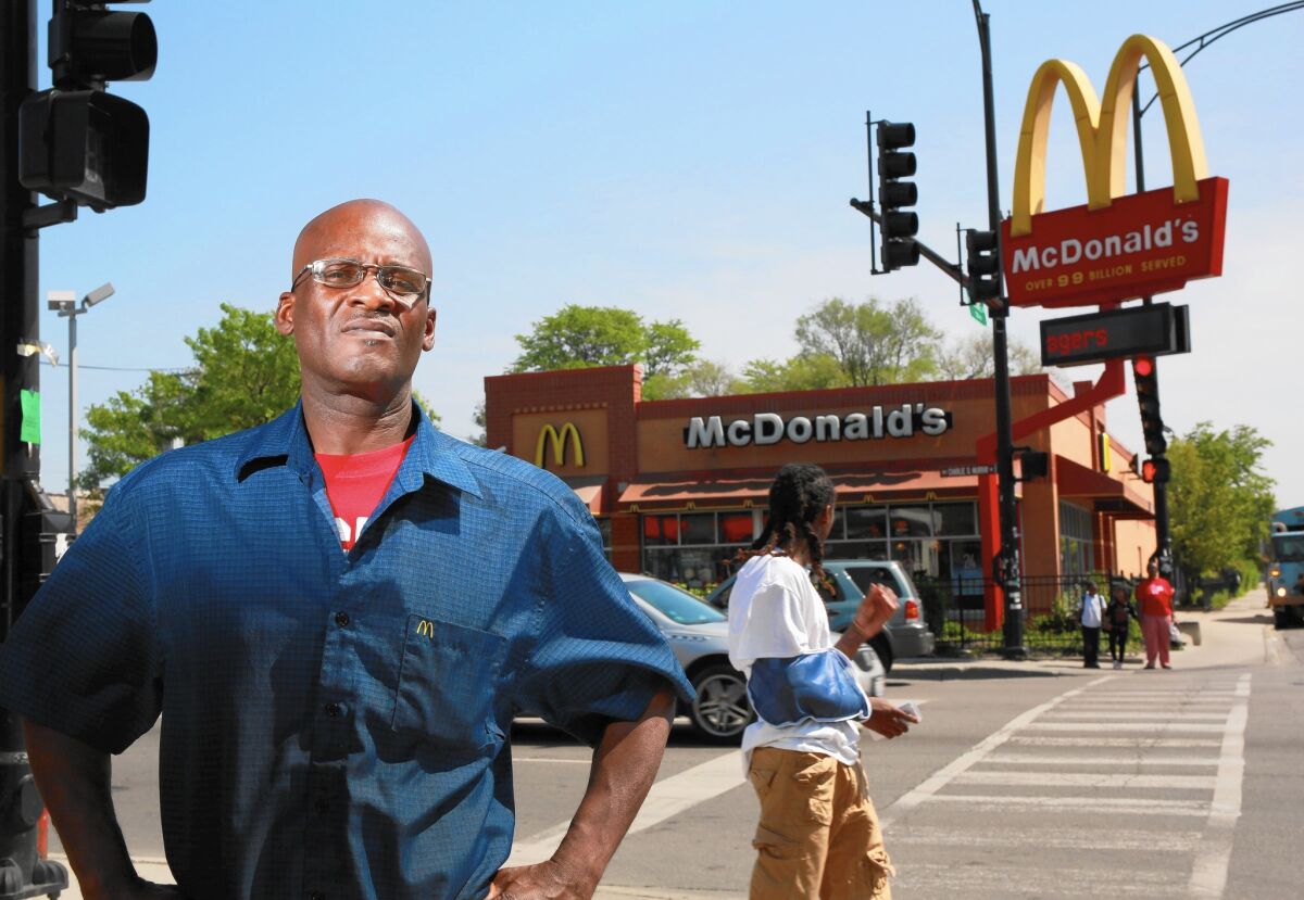 Douglas Hunter, 53, works at this McDonald's restaurant in Chicago. Hunter appeared on a poster for the Fight for $15, a campaign to increase minimum wage for fast-food workers.