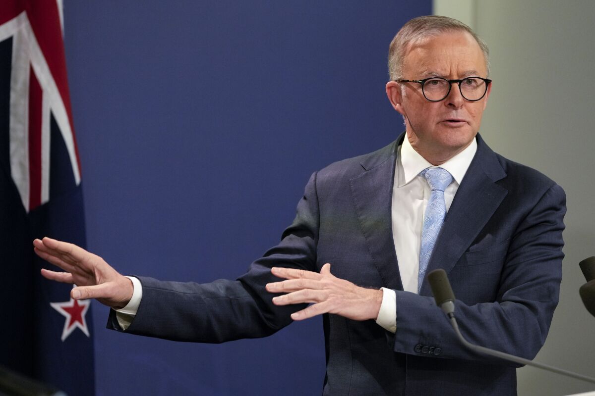 FILE - Australian Prime Minister Anthony Albanese gestures during a joint press conference with New Zealand Prime Minister Jacinda Ardern, in Sydney, Australia on June 10, 2022. Albanese said on Friday, June 17, 2022 he would take advice on whether to accept President Volodymyr Zelenskyy's invitation to visit Ukraine during an upcoming European trip. (AP Photo/Mark Baker, File)