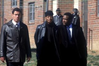 THE WIRE  HBO SERIES  JUNE 2, 2002. CAPTURES THE ENDLESS WAR ON DRUGS AS IT IS LIVED ON THE STREETS OF WEST BALTIMORE. PICTURED: DOMINIC WEST, LARRY GILLIARD, JR., WENDELL PIERCE. PHOTO CREDIT: DAVID LEE