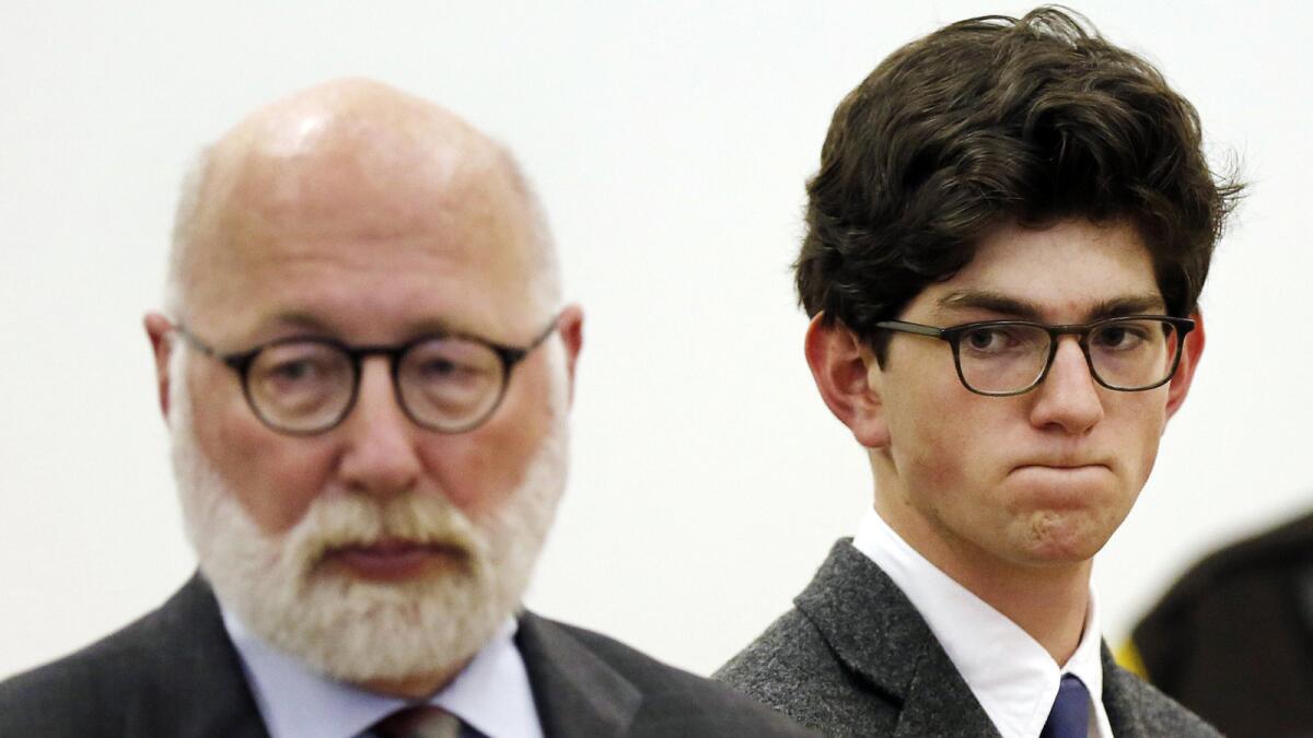 Owen Labrie, right, listens to prosecutors with his lawyer J.W. Carney, before his sentencing.
