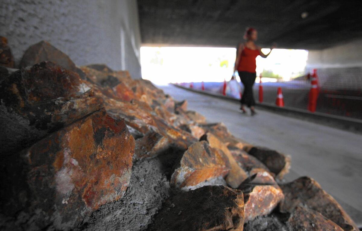 Riprap next to the walls of a 5 Freeway overpass in San Diego was installed last week at the request of nearby residents.