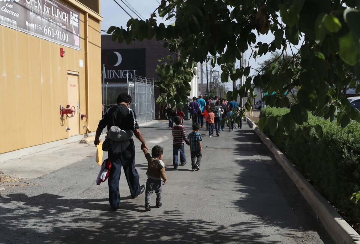 Central American migrant families depart U.S. custody  in McAllen, Texas, in 2018 pending future immigration court hearings.