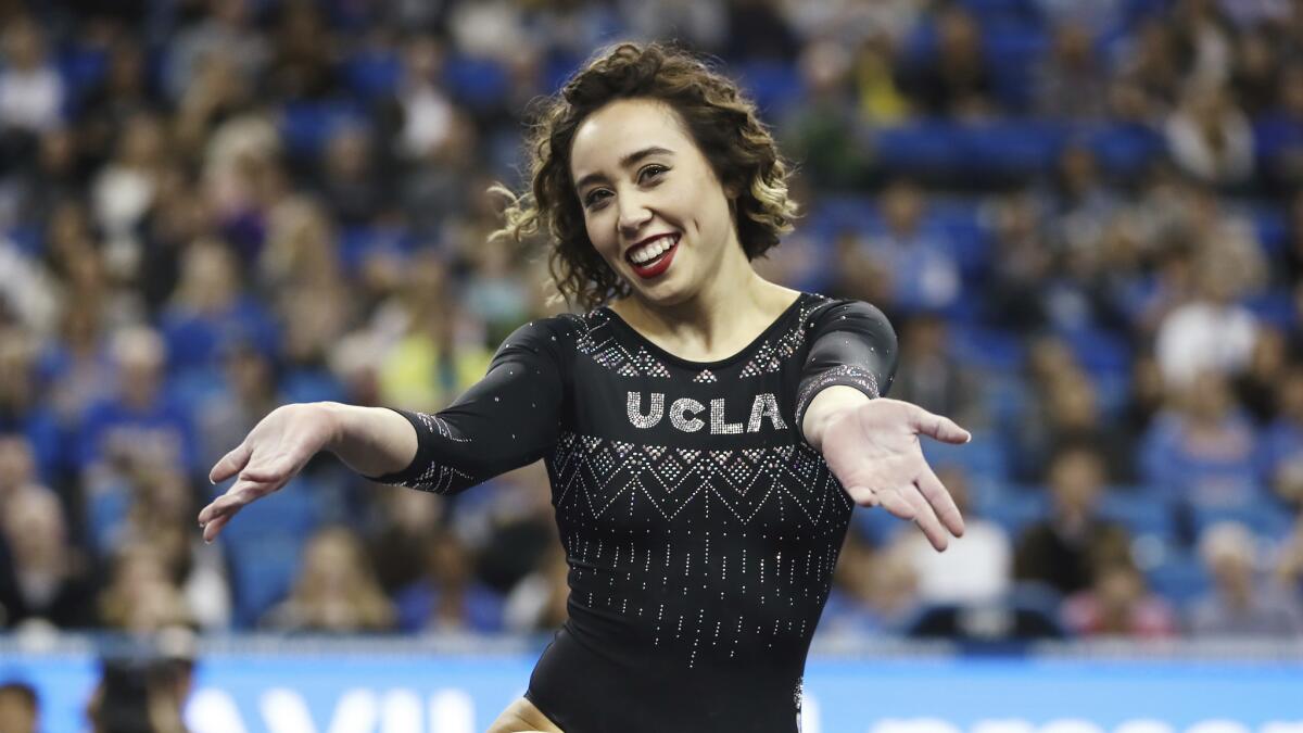 UCLA gymnast Katelyn Ohashi smiles during a meets on Jan. 4.