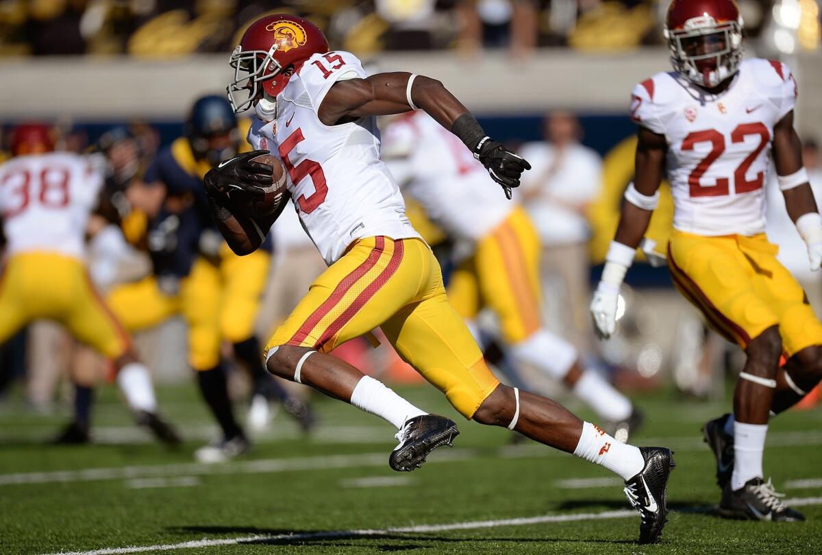 Trojans receiver Nelson Agholor breaks into the clear on a 93-yard punt return for a touchdown against California in the second quarter Saturday at Memorial Stadium in Berkeley. Agholor had a 75-yard punt return for a touchdown in the first quarter.