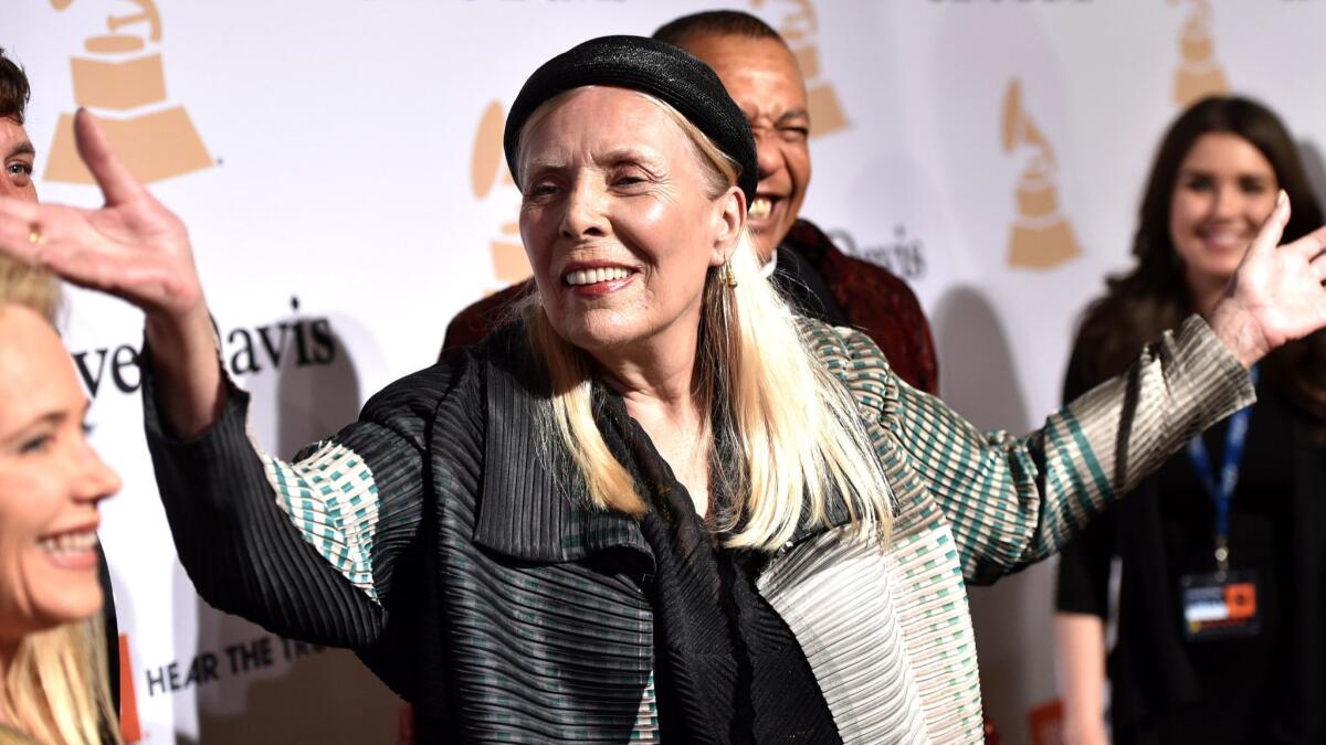 Joni Mitchell arrives at the 2015 Clive Davis Pre-Grammy Gala in Beverly Hills.