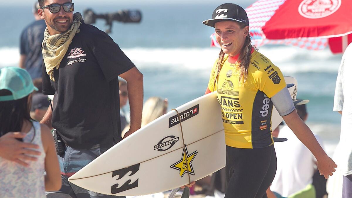 Sage Hill alumna Courtney Conlogue won a surfing contest on Sunday in Fiji.