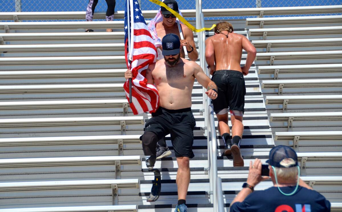 Co-founders Kyle Kelly and Danny Nichols manage the stair exercise during Operation Open Water 9/11 Honor Challenge.