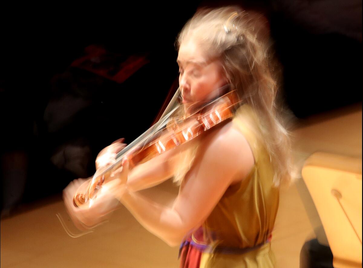 Violinist Leila Josefowicz performs onstage at Disney Hall.