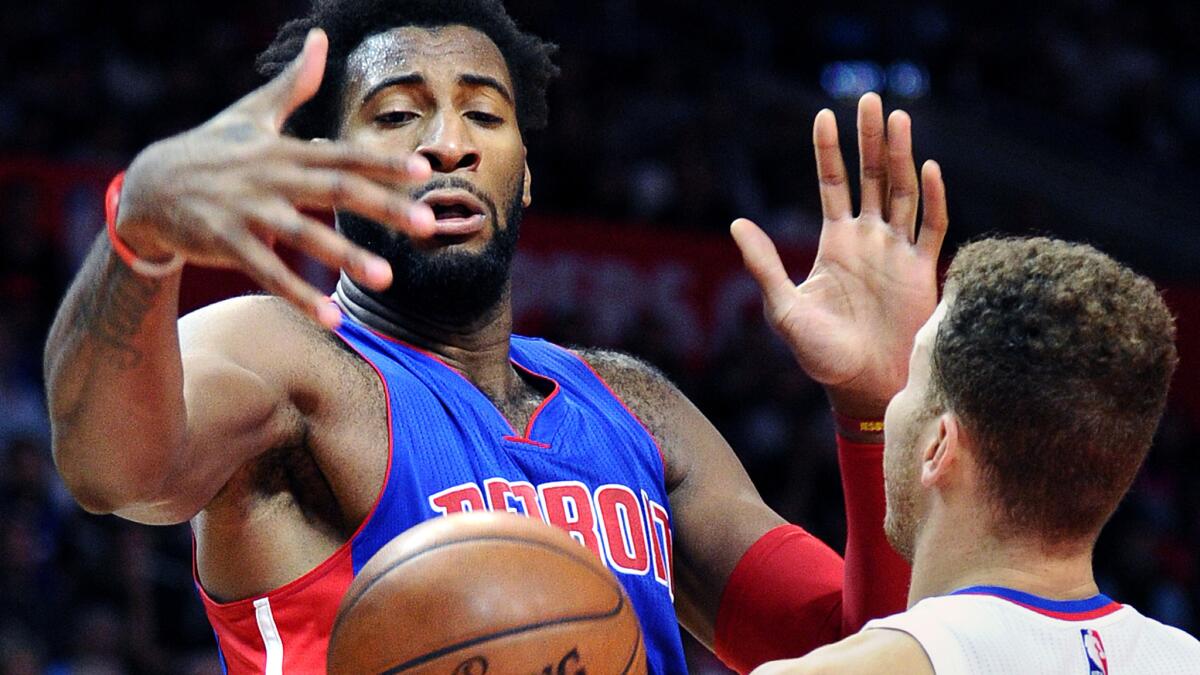 Pistons center Andre Drummond loses control of the ball against Clippers forward Blake Griffin during a game at Staples Center on Nov. 14.