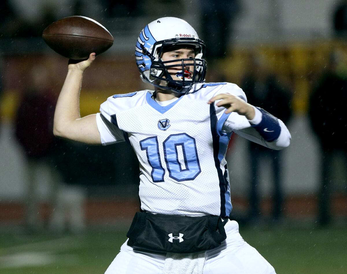 Crescenta Valley QB Chase Center throws in the CIF SS Div. X championship game vs. Simi Valley High, at SMHS in Simi Valley on Saturday, Nov. 29, 2019.