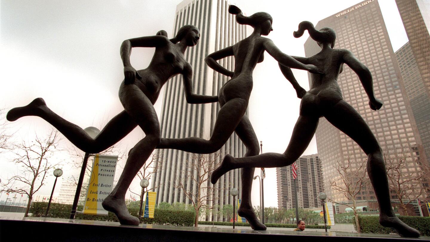 Milton Hebald's 1986 "Olympiade '84," a bronze depicting three women racing in full stride, stands outside the front entrance to the Stuart Ketchum Downtown YMCA in Los Angeles.