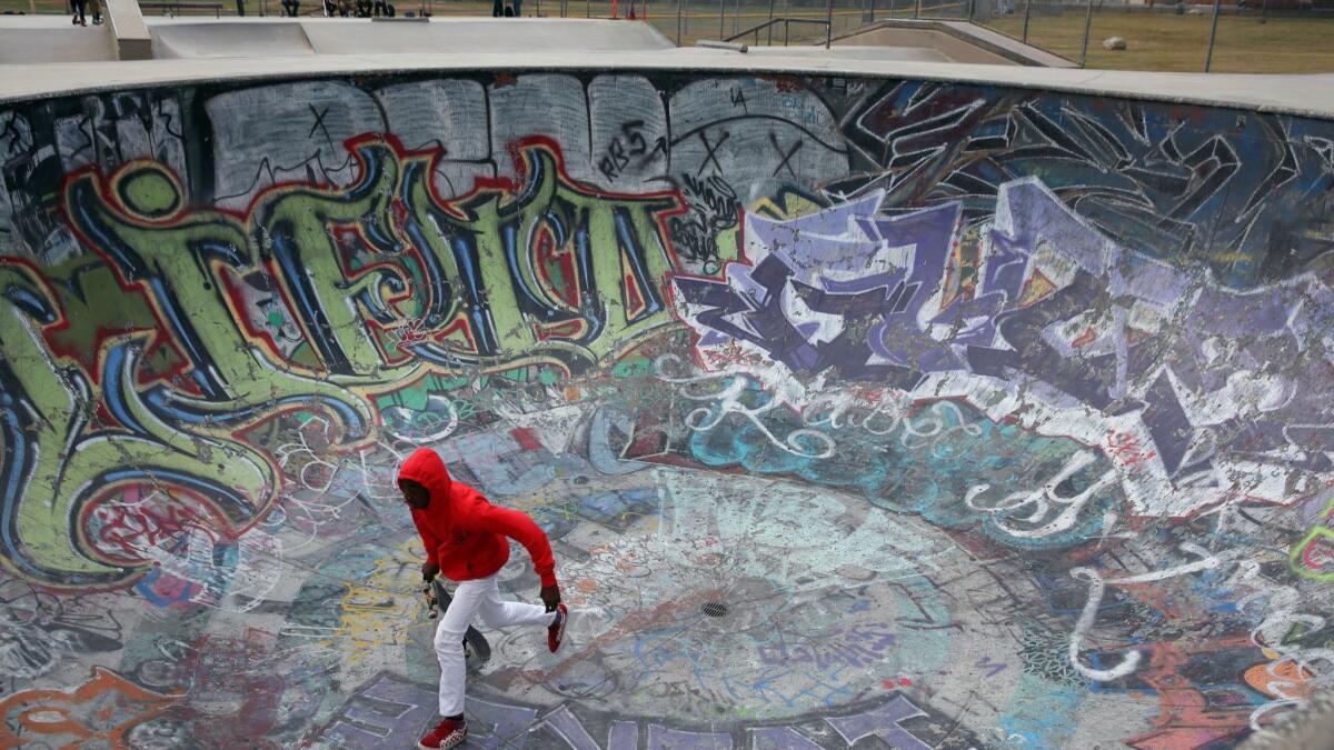 Khordae Phillips, 14, skates in Garvanza Skate Park’s graffiti-drenched bowl that attracts top skaters from around Southern California.