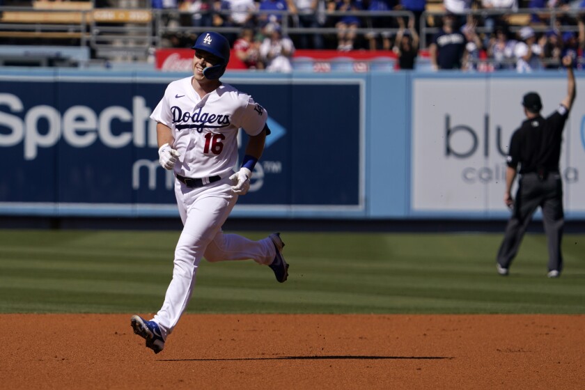 Will Smith rounds the bases on a home run in the first inning on July 2, 2022.