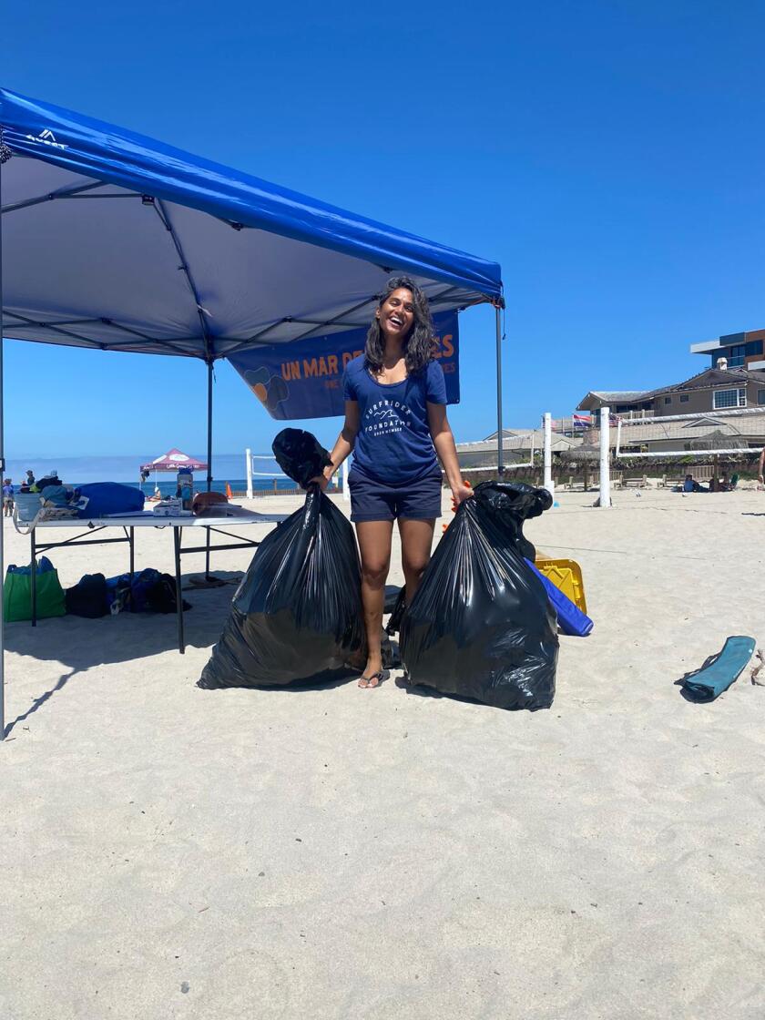 Surfrider's "Morning After Mess" beach cleanup at Moonlight Beach.