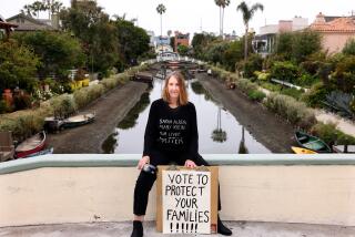 VENICE-CA-MAY 31, 2024: Venice resident and artist Mary Klein is photographed at the Venice Canals where she was attacked last April, on May 31, 2024. (Christina House / Los Angeles Times)