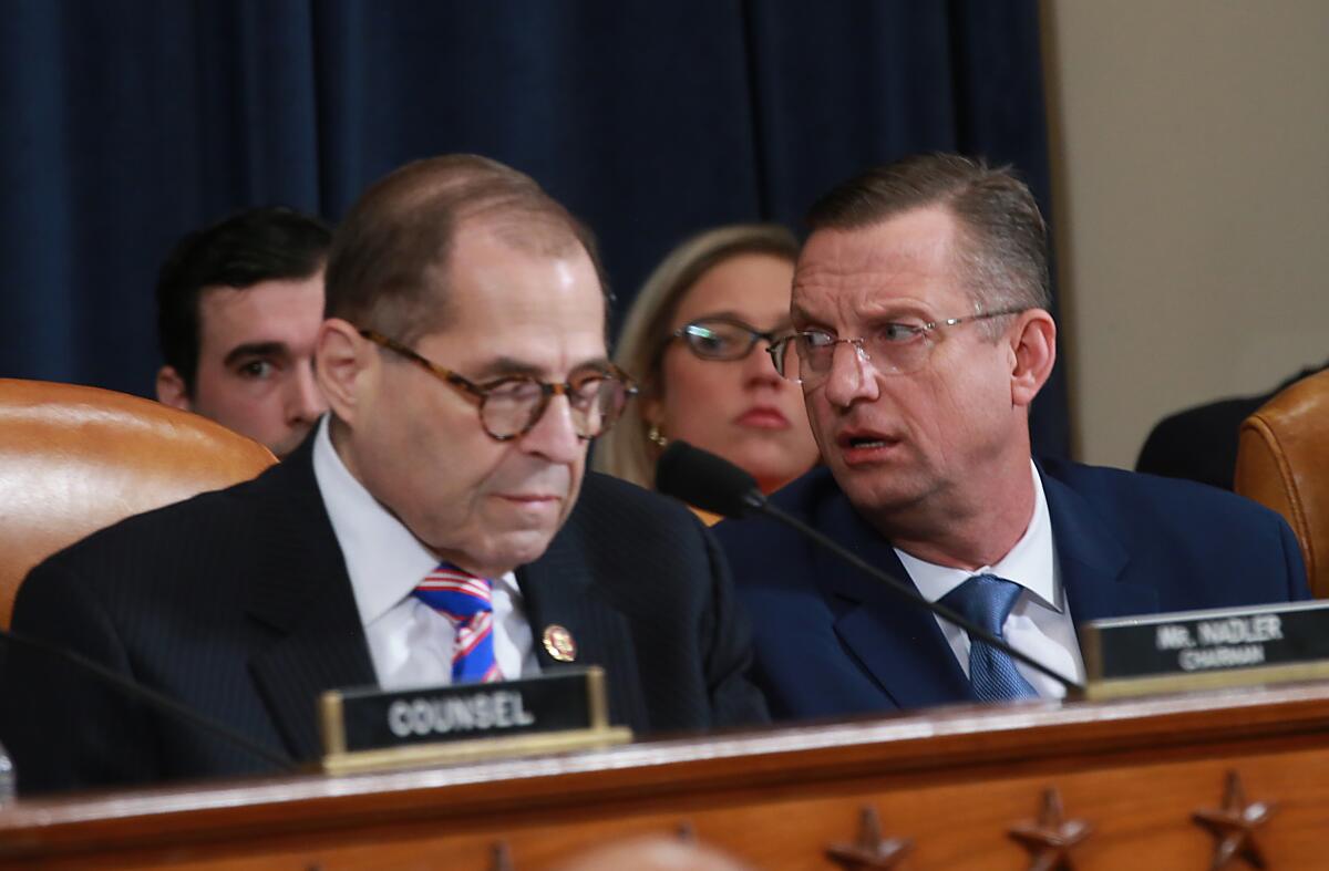 Chairman Jerry Nadler (D-N.Y.) and Rep. Doug Colins (R-Ga.) start the House Judiciary Committee's impeachment hearing on Dec. 4. 